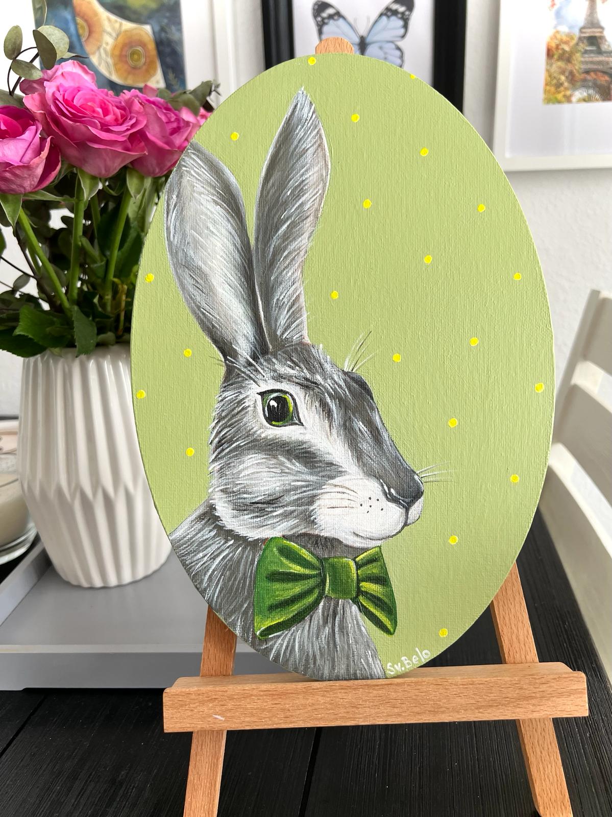 Gray hare with dark green bow tie. Acrylic painting on canvas, oval, 20*30 cm. Gift idea, wall decoration, country house decor.