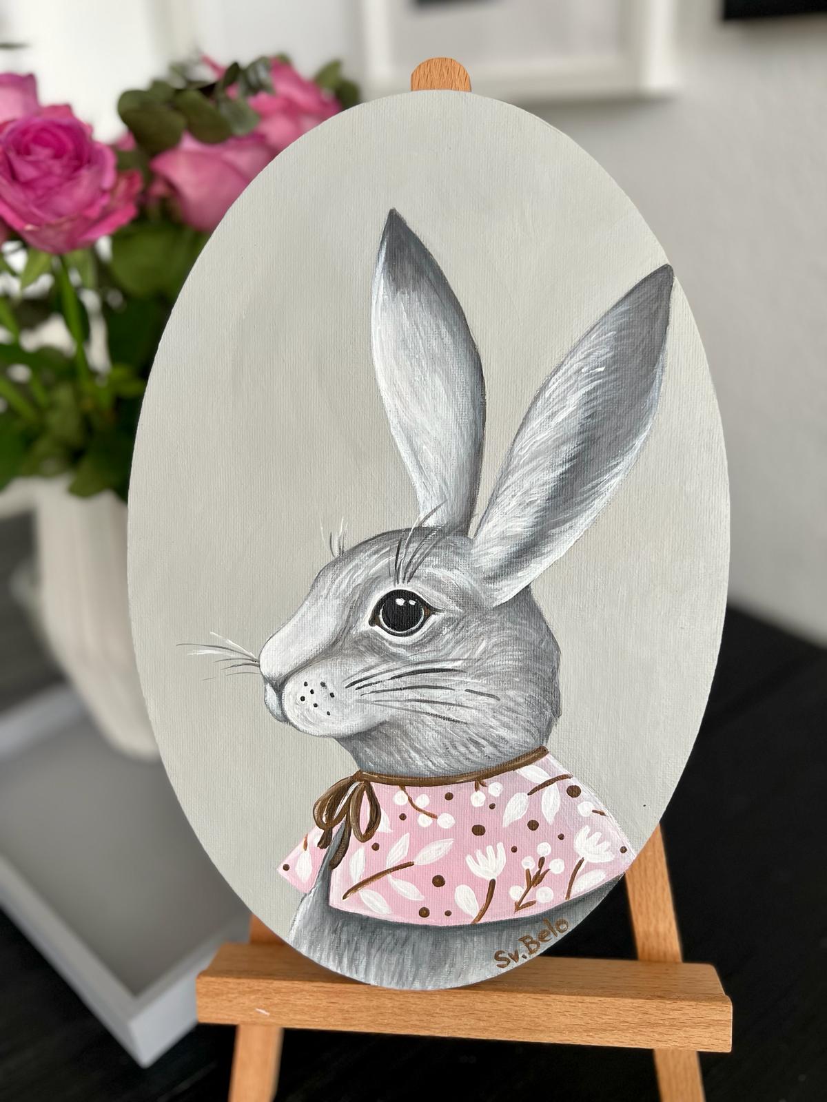 A gray rabbit with a pink collar. Acrylic painting on canvas, oval, 20*30 cm. Gift idea, wall decoration, country house decor.