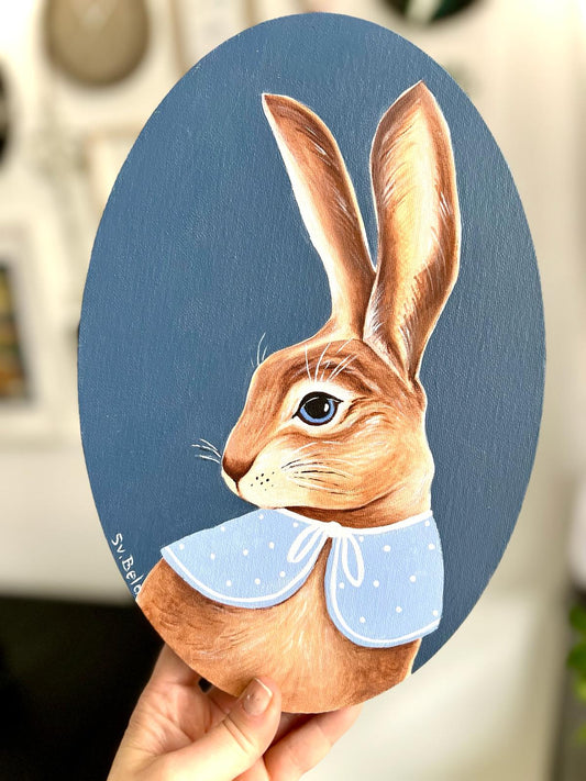 Easter Bunny. Brown rabbit on dark blue background with blue collar. Acrylic painting on canvas, oval, 20*30 cm, gift idea, wall decoration, country house decor.