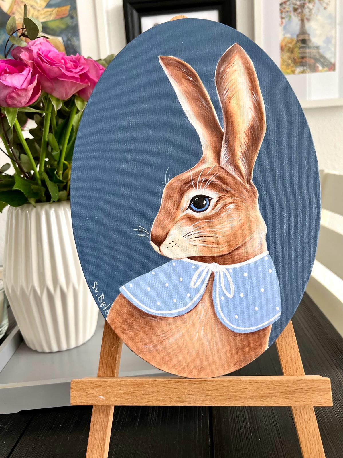 Easter Bunny. Brown rabbit on dark blue background with blue collar. Acrylic painting on canvas, oval, 20*30 cm, gift idea, wall decoration, country house decor.