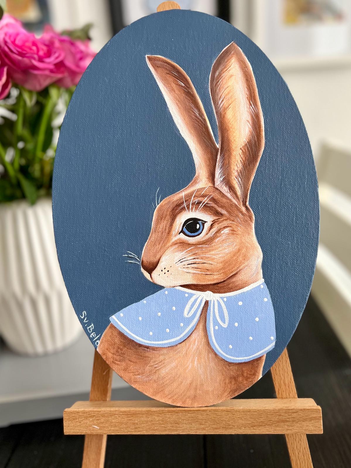 Easter Bunny. Brown rabbit on dark blue background with blue collar. Acrylic painting on canvas, oval, 20*30 cm, gift idea, wall decoration, country house decor.