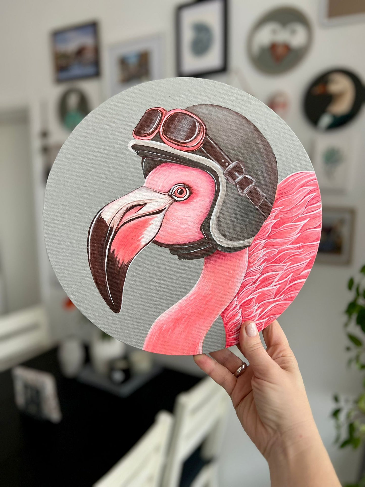 Pink flamingo with motorcycle helmet. Acrylic painting on canvas, round, 30 cm, gift idea, wall decoration, country house decor.