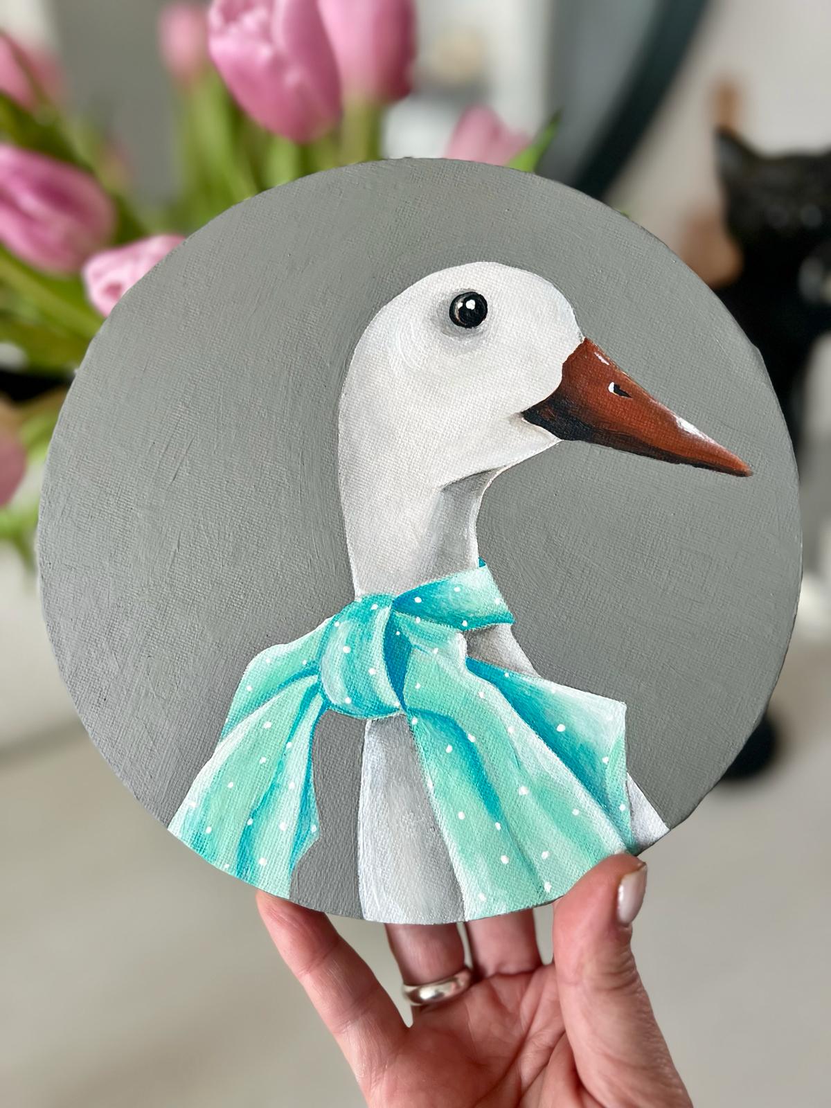 White goose with a delicate green and blue bow. Acrylic painting on canvas, round, 20 cm, gift idea, wall decoration, country house decor.